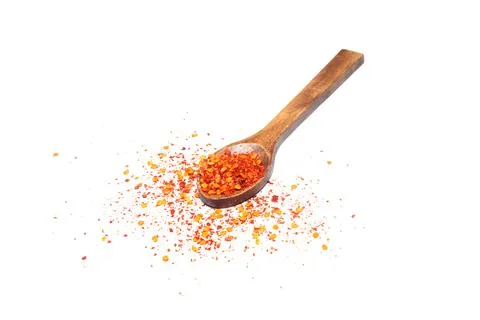 Red ground paprika powdered or dry chili pepper with wooden spoon isolated Stock Photos
