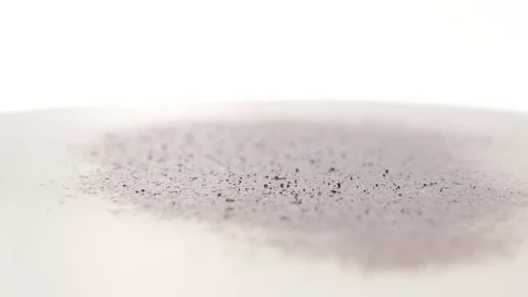 Red ground pepper added to milk. Close up, slow motion Vidéo 76145870