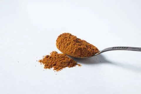 Red ground pepper on a white background. Stock Photos