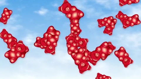 Red Gummy Bears Falling and Floating Against a Blue Sky Background Stock Footage 344836355