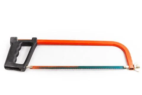 Red hacksaw on a white background in studio Stock Photos