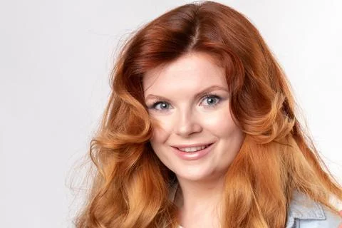 Red-hair Model posing in studio Stock Photos