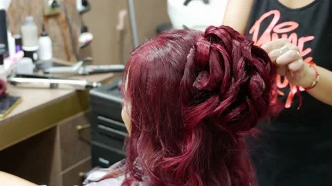 Red haired bride prep at beauty saloon hairstyle sliding shot Vídeo Stock 239987781