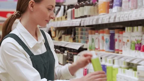 Red-haired customer examines hygiene department closeup Stockbeeldmateriaal 202305294