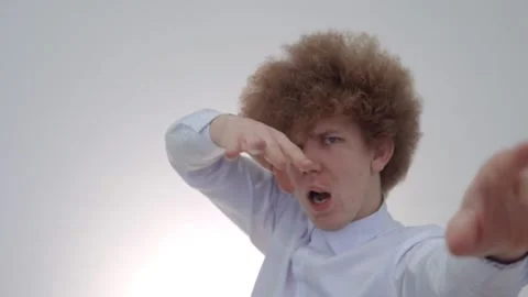 A red-haired man effectively moves his hands Stock Footage 146576331