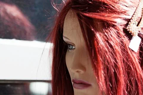 Red-haired model head for a mannequin Stock Photos