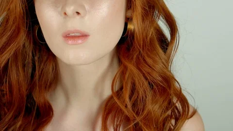 Red-haired model posing and showing happy emotions while taking pictures Stock Footage 88863169