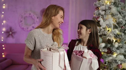 Red-haired single mother with long-haired teenage son pick up gift boxes, laugh Stock-Footage 164622787