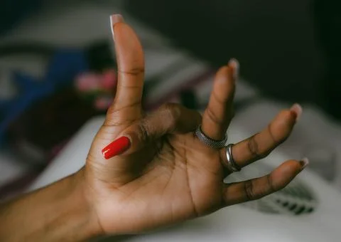 Red hand and nail Stock Photos