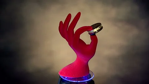 Red hand with bitcoins Stock Footage 85762079