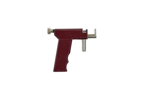 Red Handheld Ear piercing gun Tool With Silver Nozzle Isolated On White Backgrou Stock Photos