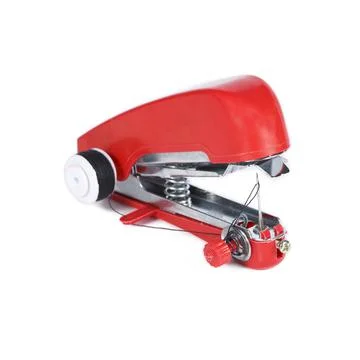 Red handheld sewing machine isolated on white Stock Photos