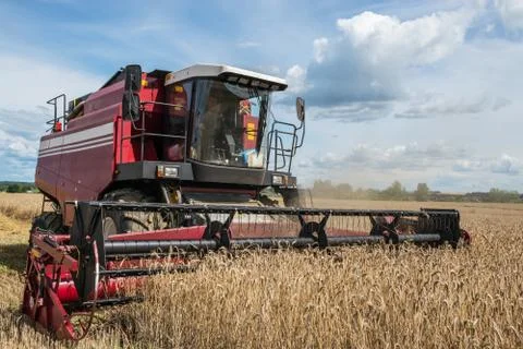 Red harvester at work Stock Photos
