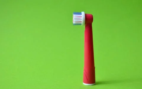 Red head for electric toothbrush. Stock Photos