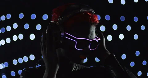 Red Head Gril Headphone LED Glasses Remix Stock Footage 49124339