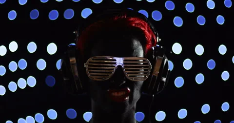 Red Head Gril Headphone Lights Face Disco Video stock 49140845