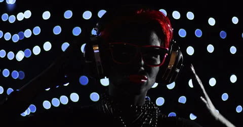 Red Head Gril Headphone Lights 8 Stock Footage 49183434
