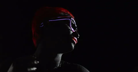 Red Head Turning LED Glasses 1 Remix Stock Footage 49170728