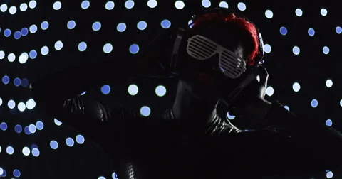 Red Head Turning Nerd Glasses Headphones Lights 1 Stock Footage 49189749