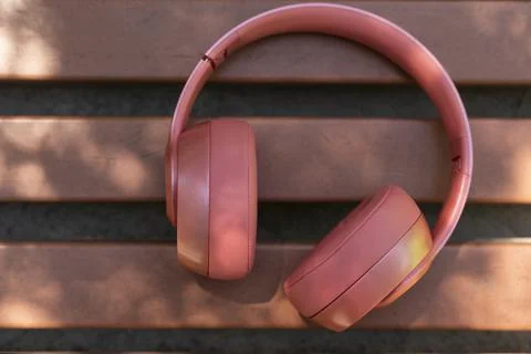 A red headphone on a bench Stock Photos