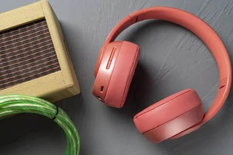 A red headphone on gray background Stock Photos