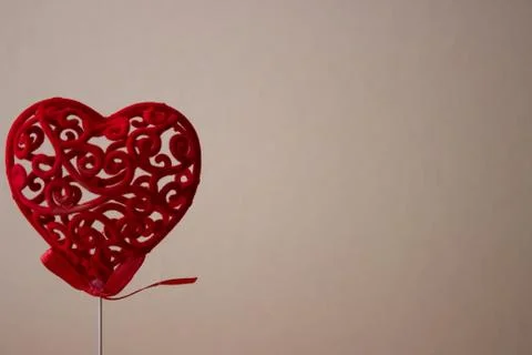 Red heart on the background of a gray wall. Valentine Day Concept Stock Photos