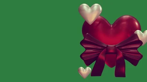 A red heart with bow on green background and hearts green screen animated Видео 335129803