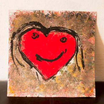 Red heart with face Stock Photos