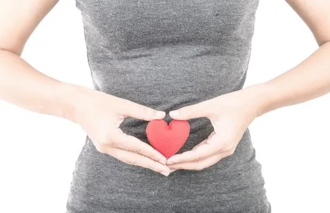 Red heart in human hand with dramatic tone Stock Photos