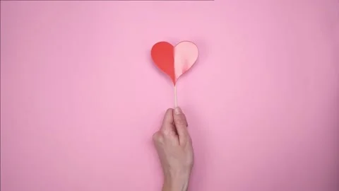 Red heart on pink background. Stock Footage 147947119