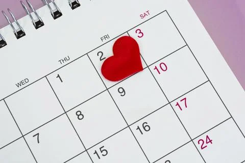 Red heart shape on the date of the 2nd day in the calendar. Stock Photos