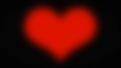 Red heart shape with grain texture on a black background Stock Illustration