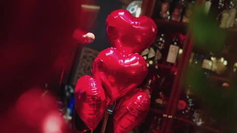 Red heart shaped balloons Stock Footage 302542403