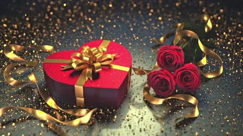 A red heart-shaped box with a gold bow, glitter, and roses creates a luxuri.. Video stock 295032023