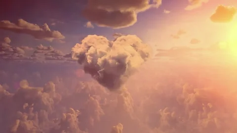 Red heart shaped clouds at sunset. Beautiful love background with copy space Video stock 255501361