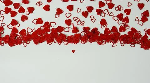 A red heart shaped confetti border with copy space. Stock Photos