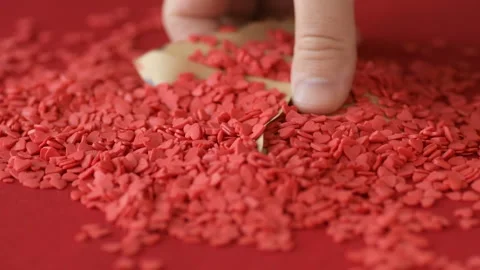 Red heart shaped confetti fall out valentine card Stock Footage 147033346