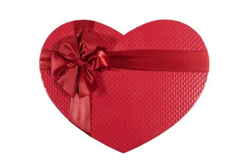 Red Heart-Shaped Gift Box With Satin Ribbon Bow for Valentine Romance and Celebr Stock Photos