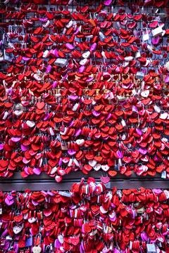 Red heart shaped padlocks on a wall Stock Photos