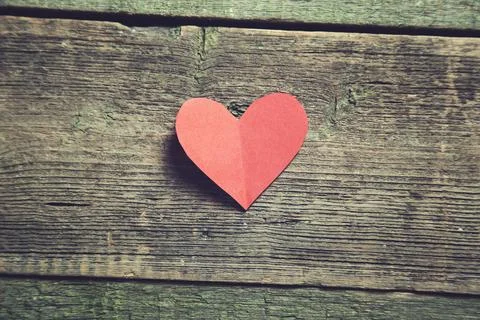 Red heart on table Stock Photos