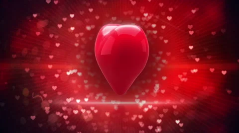 Red heart turning and exploding on glittering background Stock Footage 45374371