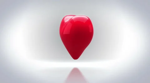 Red heart turning and exploding on grey background Stock Footage 45374374