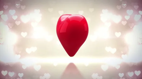 Red heart turning and exploding on glittering background Stock Footage 45374406