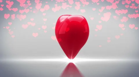 Red heart turning and exploding on grey background Stock Footage 45374454