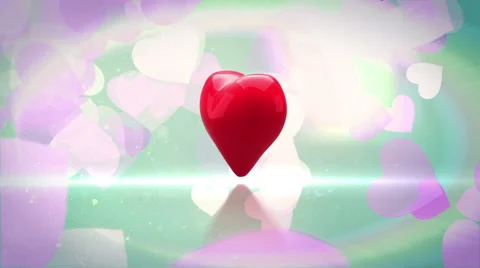 Red heart turning and exploding on glittering background Stock Footage 45374948