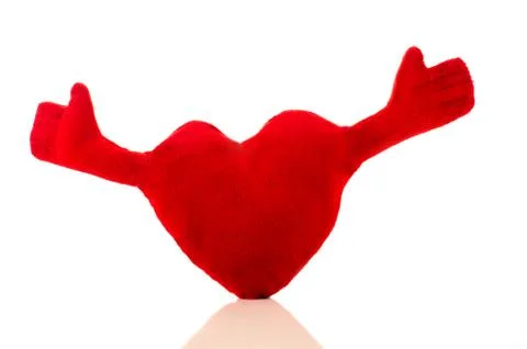 Red heart with two hands Stock Photos