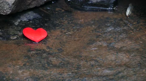 Red heart on water fall background, Stock Footage 66924057