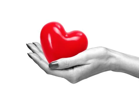 Red heart in woman hand, isolated on white Fotos de archivo