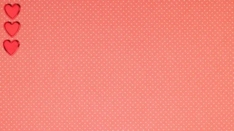 Red hearts appear on left , bottom and right side- Valentine's day - Stop motion Video stock 123508243