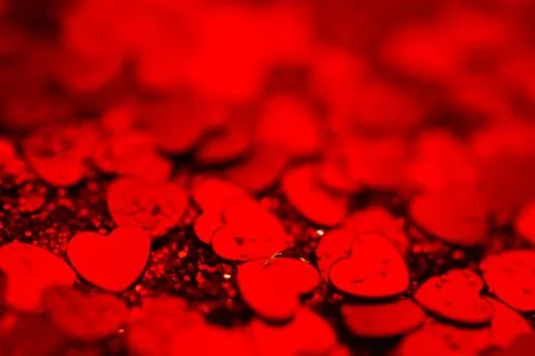 Red hearts confetti texture. Happy Valentines day background. Stock Photos